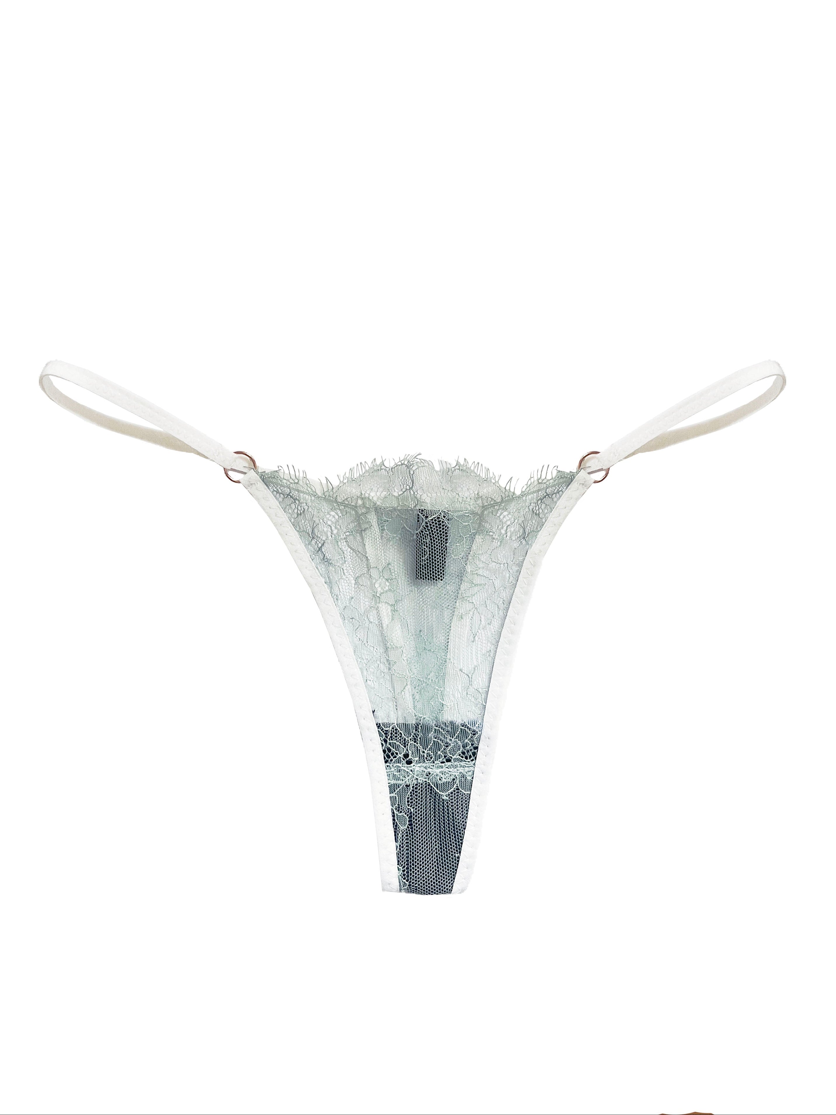 teal lace thong bottom with white straps on a white background