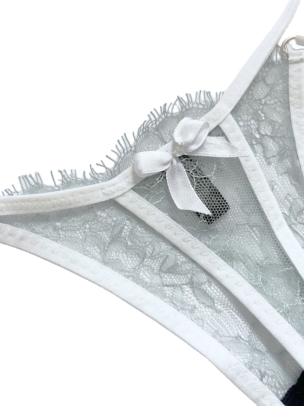 Lace thong with a bow on a white background