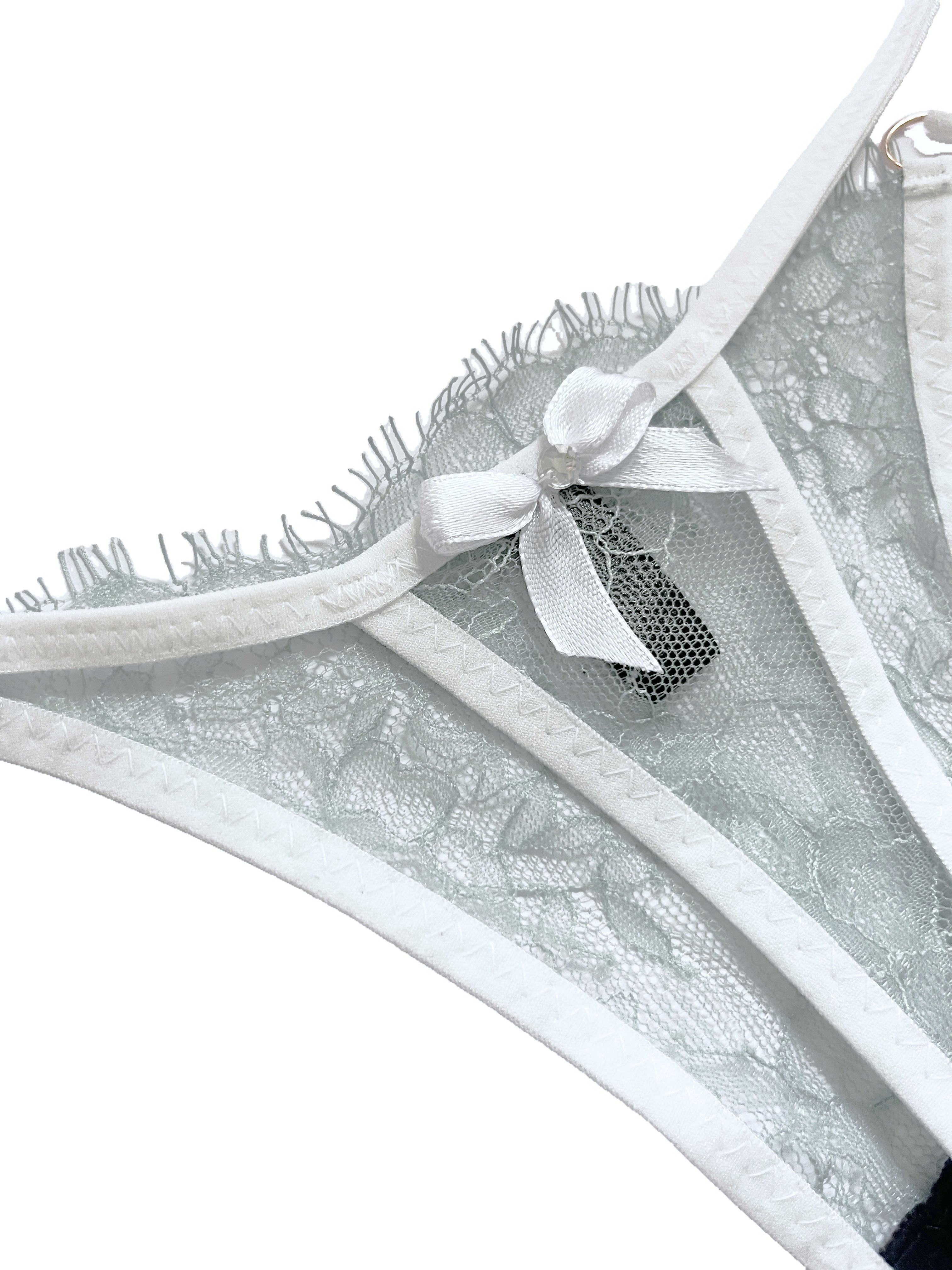 Lace thong with a bow on a white background