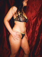 Red velvet backdrop with black lace set and neon trim